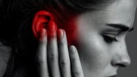 Young woman with ear pain, holding her ear with red glow indicating inflammation or infection, shown in profile against black and white background.