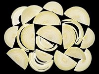 Sliced white onion pieces scattered, isolated on transparent background, ready for food design, stickers, print on demand, T-shirt design, and culinary clipart use.
