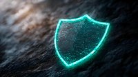 Glowing turquoise shield icon on dark textured background represents digital security, data protection and cybersecurity concepts for business technology.