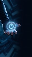 Hand holding glowing power button symbol representing digital technology, energy management, and innovation for business and tech applications.