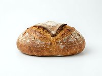 Artisan sourdough loaf with crispy golden crust and flour dusting, isolated on white background for bakery, food, and culinary design projects.