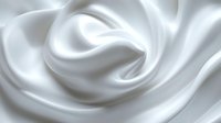 Luxurious white silk fabric with soft flowing curves and elegant folds creates gentle waves and shadows in smooth satin texture for fashion and luxury backgrounds.