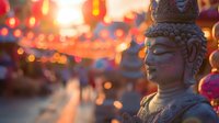 Buddha statue with warm golden sunset light and colorful bokeh lanterns creating peaceful meditation atmosphere for spiritual wellness content.