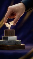 Male hand placing glowing plant sprout on stacked wooden and metal blocks against dark background, symbolizing growth, investment, and sustainable business development strategy.