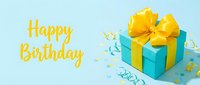 Turquoise gift box with yellow ribbon bow, confetti, and Happy Birthday text on light blue background for greeting card or banner.