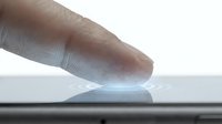 Finger touching digital screen display with interactive interface technology for touchscreen applications and user experience design.