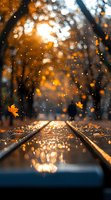 Railroad tracks with autumn maple leaf falling, surrounded by bokeh lights and golden sunset glow reflecting on wet surface, creating magical forest atmosphere.