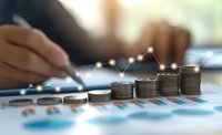 Growing stacks of coins with upward trending financial graph overlay, business person analyzing investment data on blurred background. Concept for financial growth.