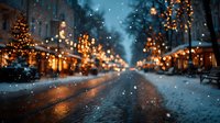 Snowy winter street at night with warm glowing lights and festive decorations creating magical holiday atmosphere for seasonal celebrations.