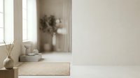 Minimalist beige interior with dried plants in ceramic vase, stacked books, and natural light from window. Neutral aesthetic for home decor, wellness, and lifestyle design projects.