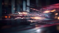 Abstract digital light trails with glowing red and orange streaks against dark background create dynamic motion effect for technology concepts.
