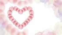 Pink spheres arranged in heart shape on soft pastel background for romantic designs, Valentine's Day cards, love themes, wedding invitations, greeting cards.