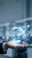 Global business growth and financial success concept with businessman hand holding glowing globe, upward arrows, and stock charts for investment, trading, and economic development.