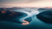 Aerial view of winding fjord with glowing coastal road at dusk, dramatic mountain landscape and tranquil turquoise waters creating mesmerizing patterns.