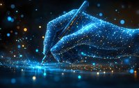Glowing blue digital hand holding pen against dark background with sparkles and light particles, creating magical writing effect on reflective surface.