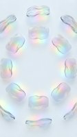 Iridescent glass shapes arranged in circle on white background, featuring pastel rainbow light reflections, isolated design element for graphic projects.