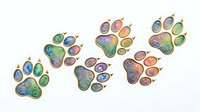 Colorful paw print designs with iridescent gradient effects, isolated on white background. Perfect for t-shirt prints, stickers, clipart, and merchandise design projects.