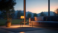 Modern at dusk, featuring gray sofa, floor lamp and potted plant against dramatic sunset sky backdrop.