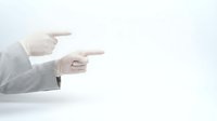 Business professional hands pointing forward in white shirt against clean background for corporate presentations and marketing materials.