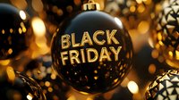 Black glossy Christmas ball ornament with golden text against blurred bokeh lights background creating festive holiday shopping atmosphere.
