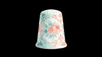 Vintage ceramic thimble with floral pattern in soft pink and teal tones, isolated on transparent background, ready for stickers, clipart, and print on demand.