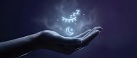 Hand holding glowing sleep symbols with moon and zzz icons floating above palm against dark purple background for wellness and rest concepts.