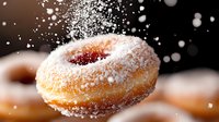 Fresh donut with powdered sugar falling in motion against dark background, macro food photography with shallow depth of field and bokeh effect.