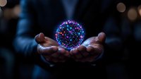 Glowing magical sphere with colorful light particles floating between hands against dark background, creating mystical atmosphere and sense of wonder.