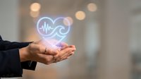 Professional hands presenting glowing healthcare infinity symbol with heartbeat pulse, representing continuous medical care and wellness technology solutions.