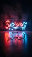 Glowing neon sorry sign with broken glass heart on dark smoky background, red and blue light, apology and heartbreak concept.