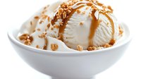 Vanilla ice cream with caramel sauce and crushed nuts in white bowl on clean background for dessert menu and food advertising.