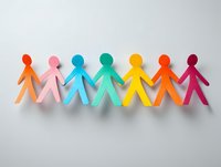 Colorful paper cutout figures holding hands in a row, symbolizing diversity, unity, and teamwork for community projects and social campaigns.