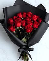 Elegant bouquet of vibrant red roses wrapped in matte black paper with satin ribbon, perfect for romantic occasions, anniversaries, or luxury gift presentations.