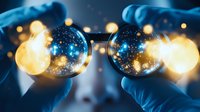 Magical eyeglasses with glowing cosmic reflections held by gloved hands against dark background, sparkling lights and stars create dreamy atmosphere.