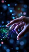 Human hand touching digital particles with glowing circuit pattern in dark background, creating magical interaction effect with purple and green lights.