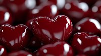 Glossy red heart shapes with reflective surfaces against dark background create romantic mood. Symbolic elements for love and Valentine's Day designs.