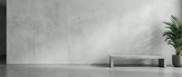 Minimalist interior with concrete wall, white bench and green plant in modern architectural space for contemporary design projects.