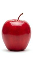 Glossy red apple with stem isolated on white background, suitable for food, nutrition, health, and wellness design projects.