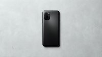 Black smartphone with dual camera setup isolated on gray concrete background, ready for mobile technology design and marketing use.