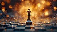 Black king chess piece standing alone on checkered board with magical golden bokeh lights and sparkles in dark atmospheric background. Perfect for strategy concepts.