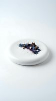 Gourmet chocolate dessert with edible flowers and purple dust on white plate isolated on white background for culinary design and restaurant menu.