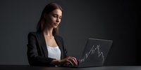 Young Caucasian businesswoman in black suit analyzing financial market data on laptop with stock chart graph against dark background.