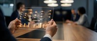Professional businessman analyzing digital financial data and charts on tablet device in modern office environment for business strategy and investment decisions.