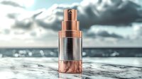 Luxury rose gold and silver cosmetic pump bottle on reflective surface against dramatic cloudy sky background. Premium skincare packaging design concept.