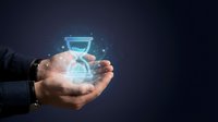Businessman hand holding glowing hourglass with digital particles, representing time management, deadline, productivity, and business efficiency concept for corporate solutions.