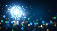 Glowing brain lightbulb with sparkling particles and bokeh lights on dark blue background representing innovation, creativity and bright ideas for business.