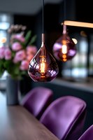 Modern purple glass pendant lamps illuminate dining area with violet chairs and soft bokeh background, creating luxurious ambiance for interior design projects.
