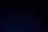Dark night sky filled with countless twinkling stars creating a serene celestial backdrop for astronomy and space-themed projects.