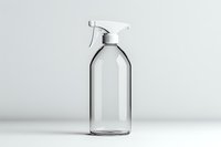 Clear glass spray bottle with trigger sprayer on white background, minimalist design for cleaning products and household supplies, isolated product photography.