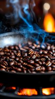 Fresh roasted coffee beans with rising blue smoke in traditional roaster, warm orange glow from fire beneath, macro close-up showing rich brown texture and aroma.
